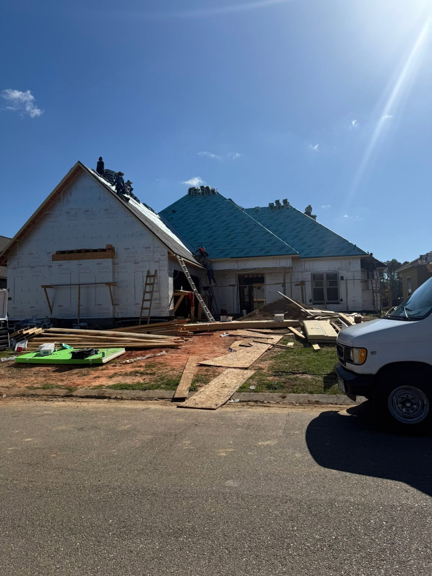 Yellow Fin house under construction — roof and framing work in progress