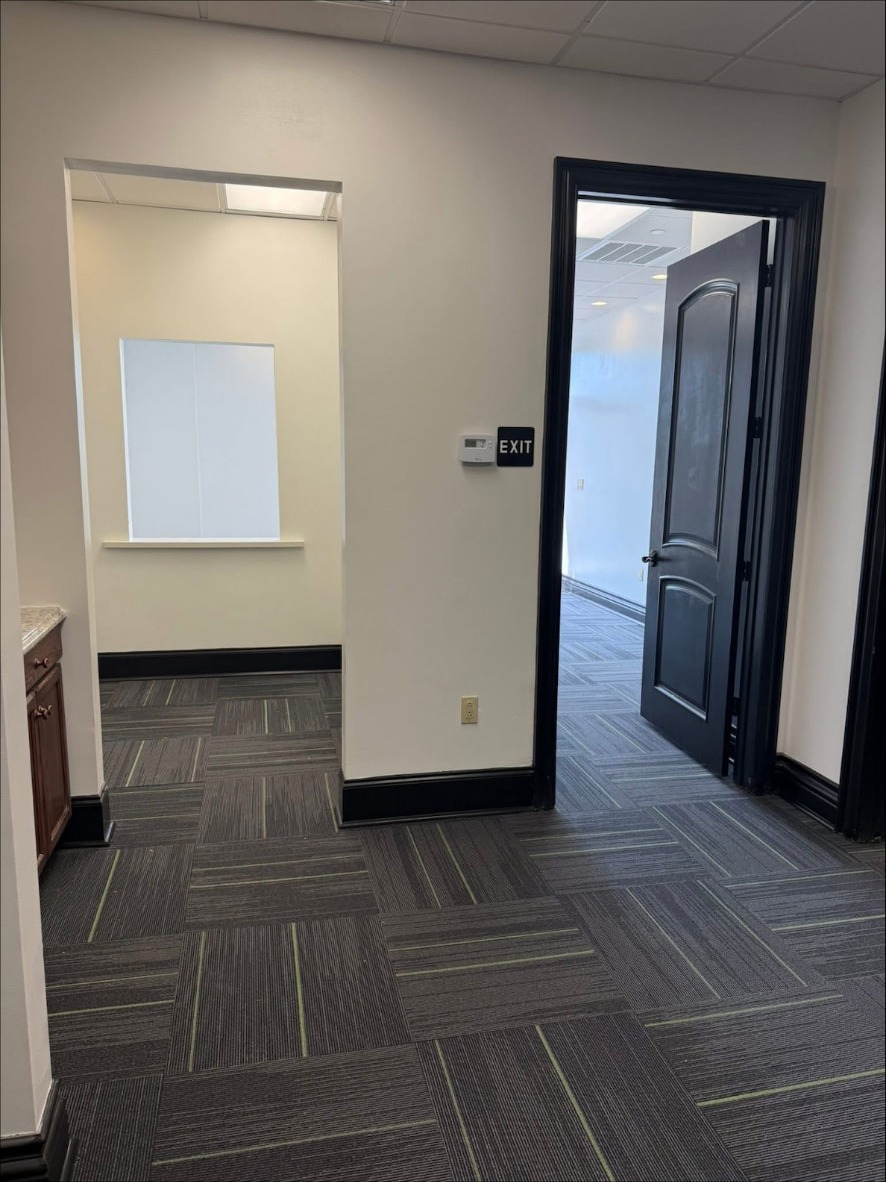 Reception area with built-in cabinetry at the Audibel clinic in Gretna